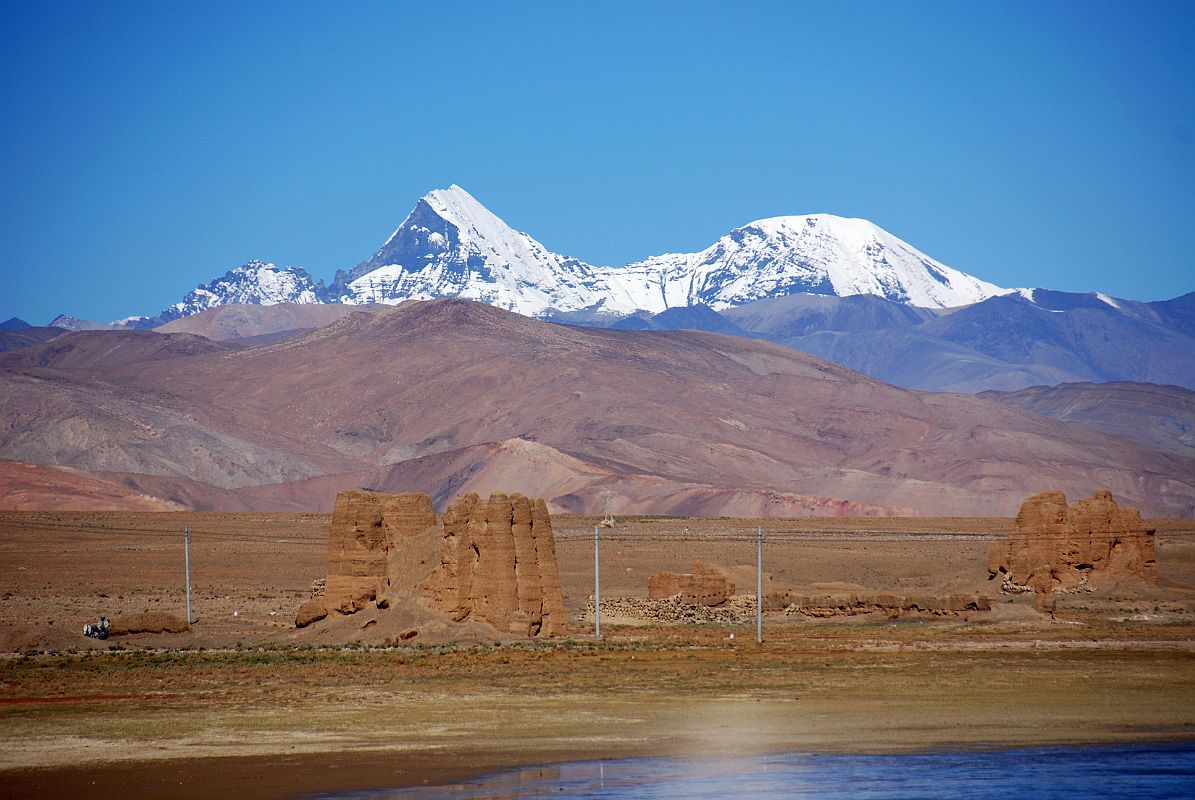 26 Zangla Peak Tsangla Ri With Ruins In Foreground From Friendship Highway Between Nyalam And Tingri Zangla Peak (6495m, also called Tsangla Ri) is visible to the north from the Friendship Highway between the Kailash road junction and Tingri, with more ruins in the foreground.